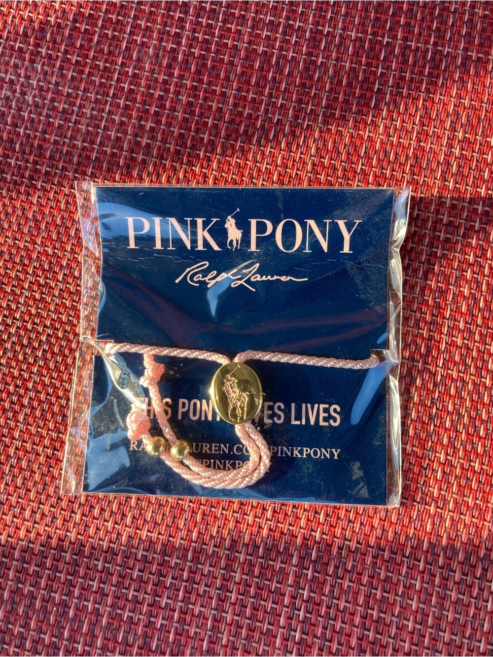 Ralph Lauren Pink Pony Light Pink Cord Bracelet with Gold Pony Charm
